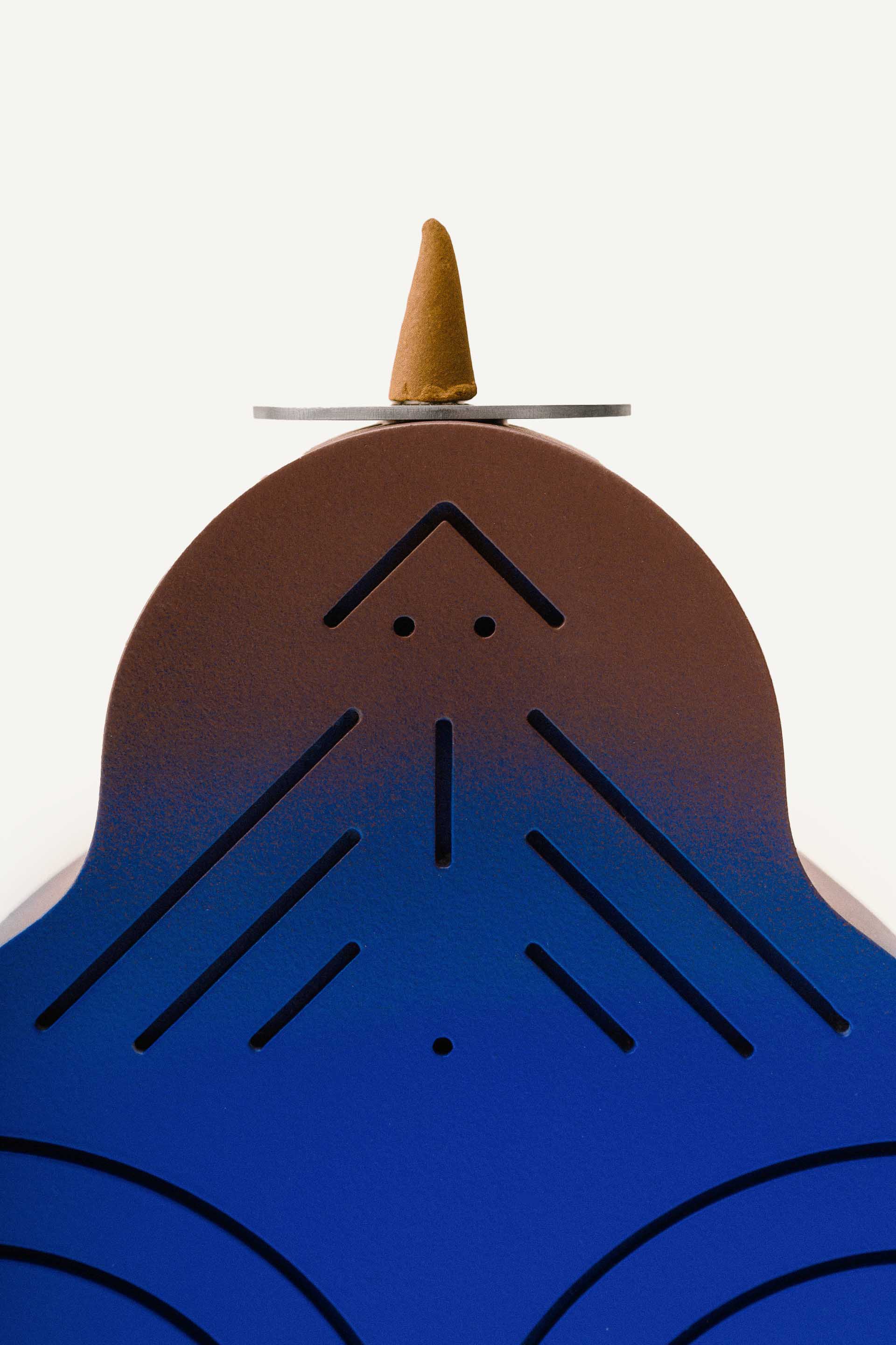 Hand-painted pressed wood figurine by LUDISM, inspired by Slavic folklore, serving as a candle holder, incense burner, and decorative object, designed and crafted in Poland.