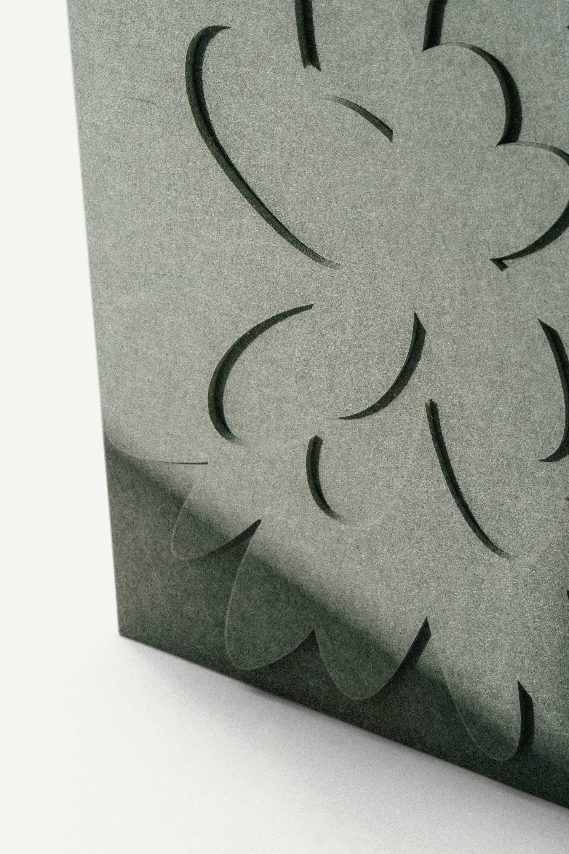 Pansy Bratek relief by LUDISM and Bafeo – sound-absorbing panel symbolizing friendship in Polish folk culture.
