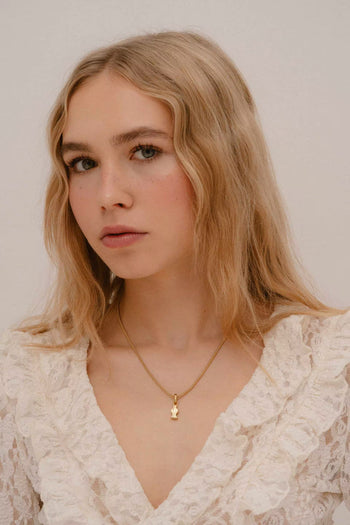 Gold Charm from Kopi x Ludism Collection